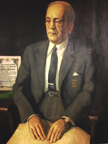 portrait of ierardi reading braille