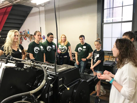 Volunteers touring the press