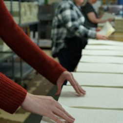 Hand collating braille pages