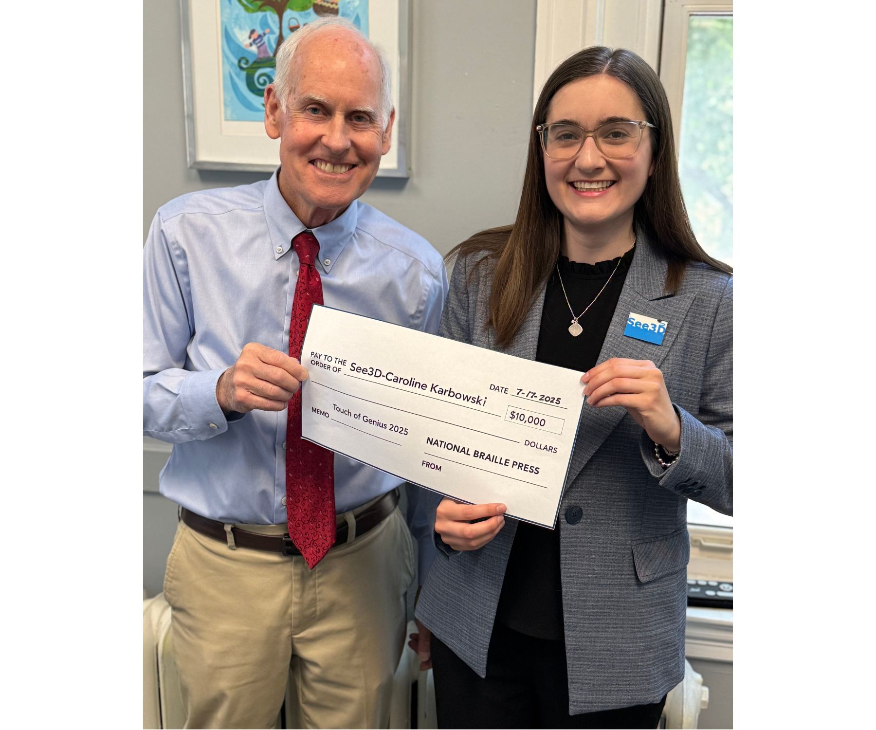 photo of Brian MacDonald, NBP President and CEO, left, and Caroline Karbowski of See3D