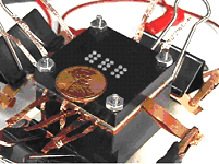 A prototype which uses an actuator array and dielectric elastomer diaphragm with thin metal traces that activate individual dots