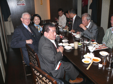 Mike Mellor at dinner with his hosts in Japan.