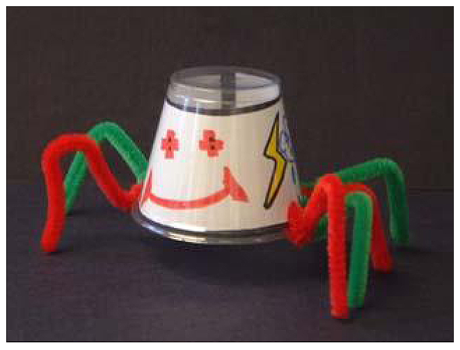 Anansi spider craft, made of plastic cup and pipe cleaners