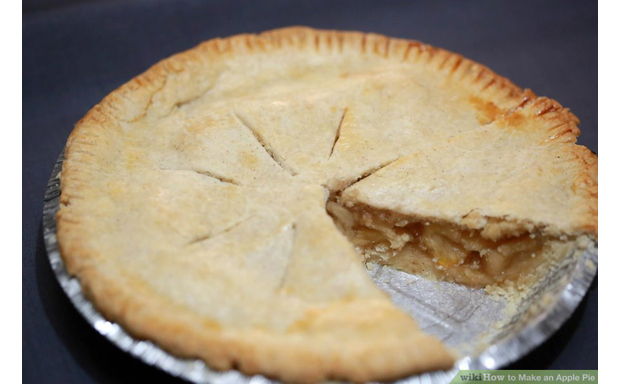 photo of apple pie with one wedge cut out