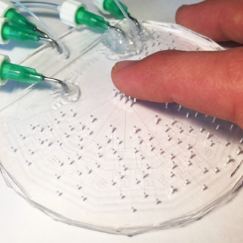 pneumatic/microfluidic raising braille and tactile graphic pins
