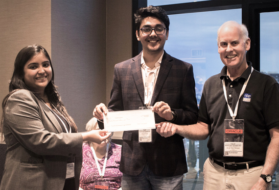 Brian MacDonald, NBP President, handing the winning check to InnoVision Technologies