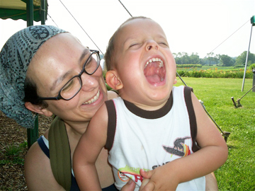 Mom and son laughing