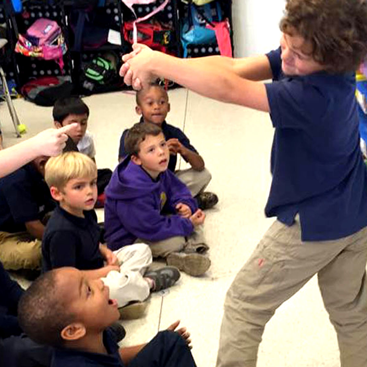 Kids playing charades