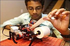 Boy and his LEGO braille printer