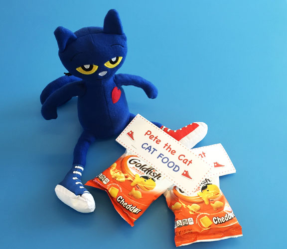 Photo of the Pete plush doll with Goldfish snacks and the downloadable Pete's Cat Food labels